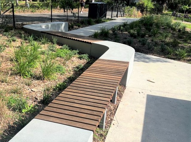 Custom Emerdyn Bench - 80x40 spotted gum timber, pctd frame Palladium Silver Satin - Sydney Park Frontage - B.JPG